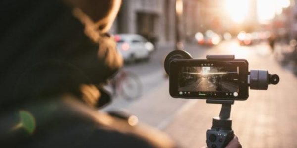 A Women Shooting with her smartphone camera